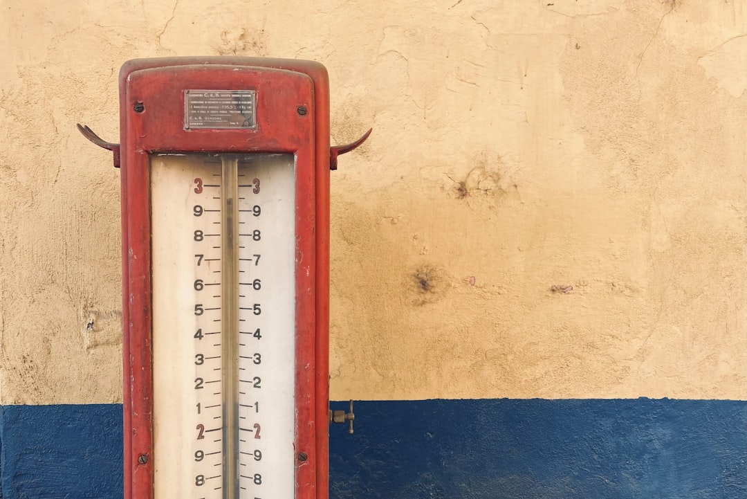 A group of speakers mounted to the side of a building